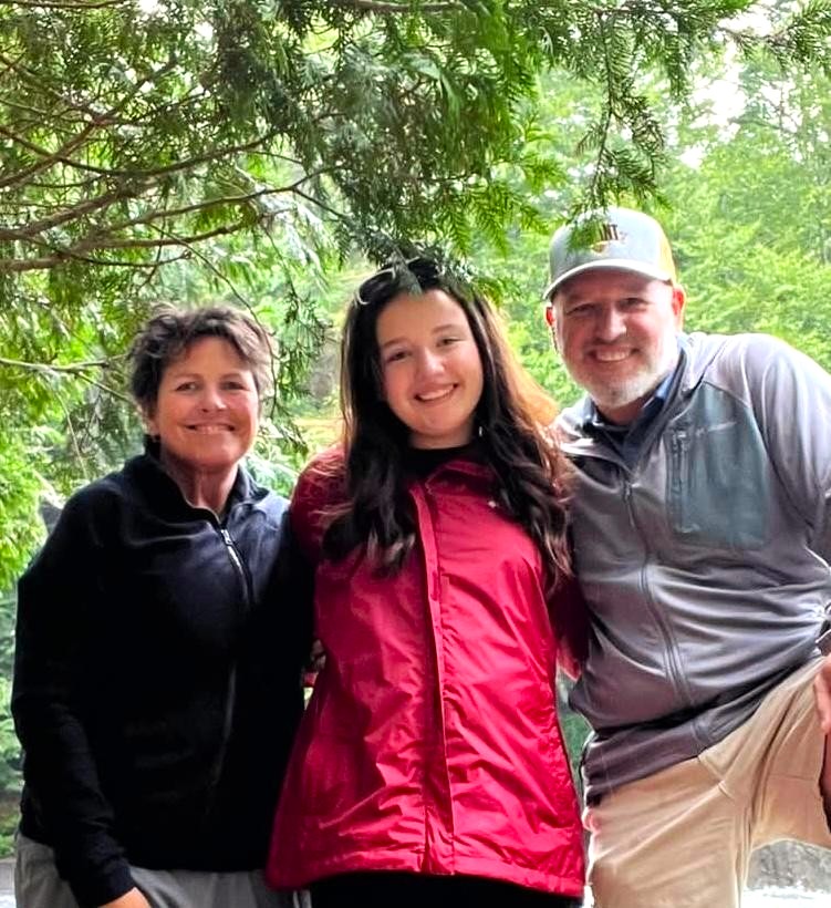 Ellen Salome with her parents